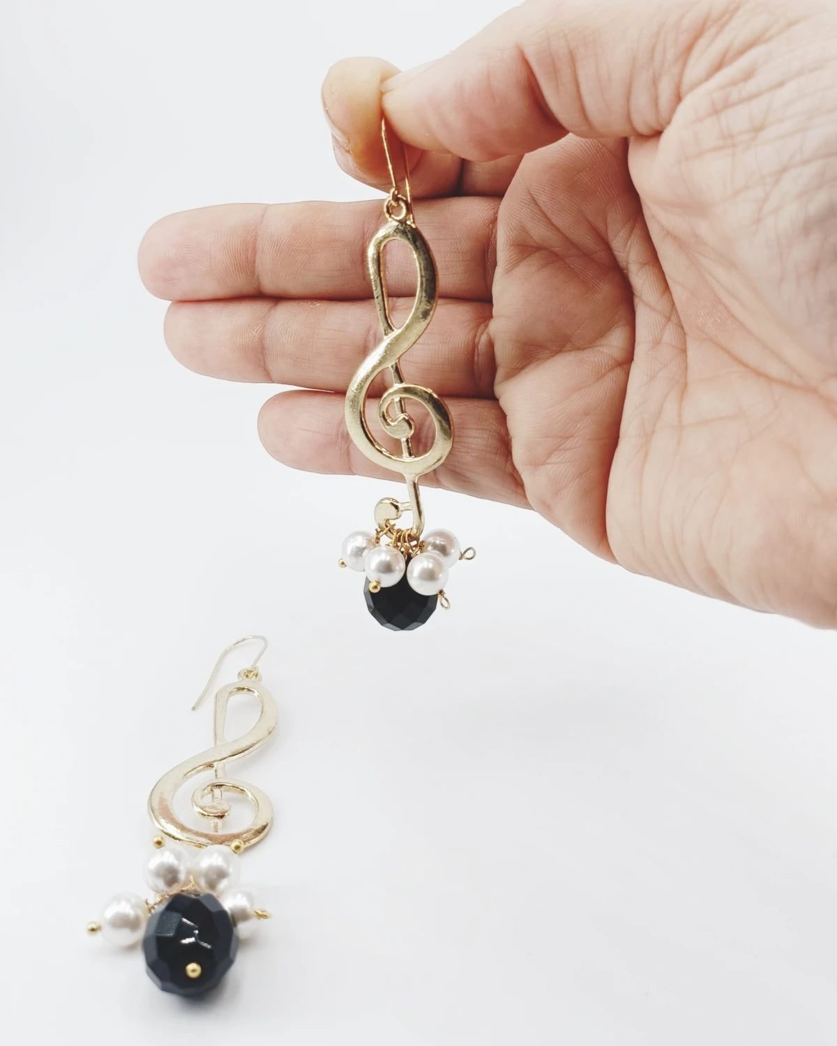 Orecchini Chiave di sol su mano