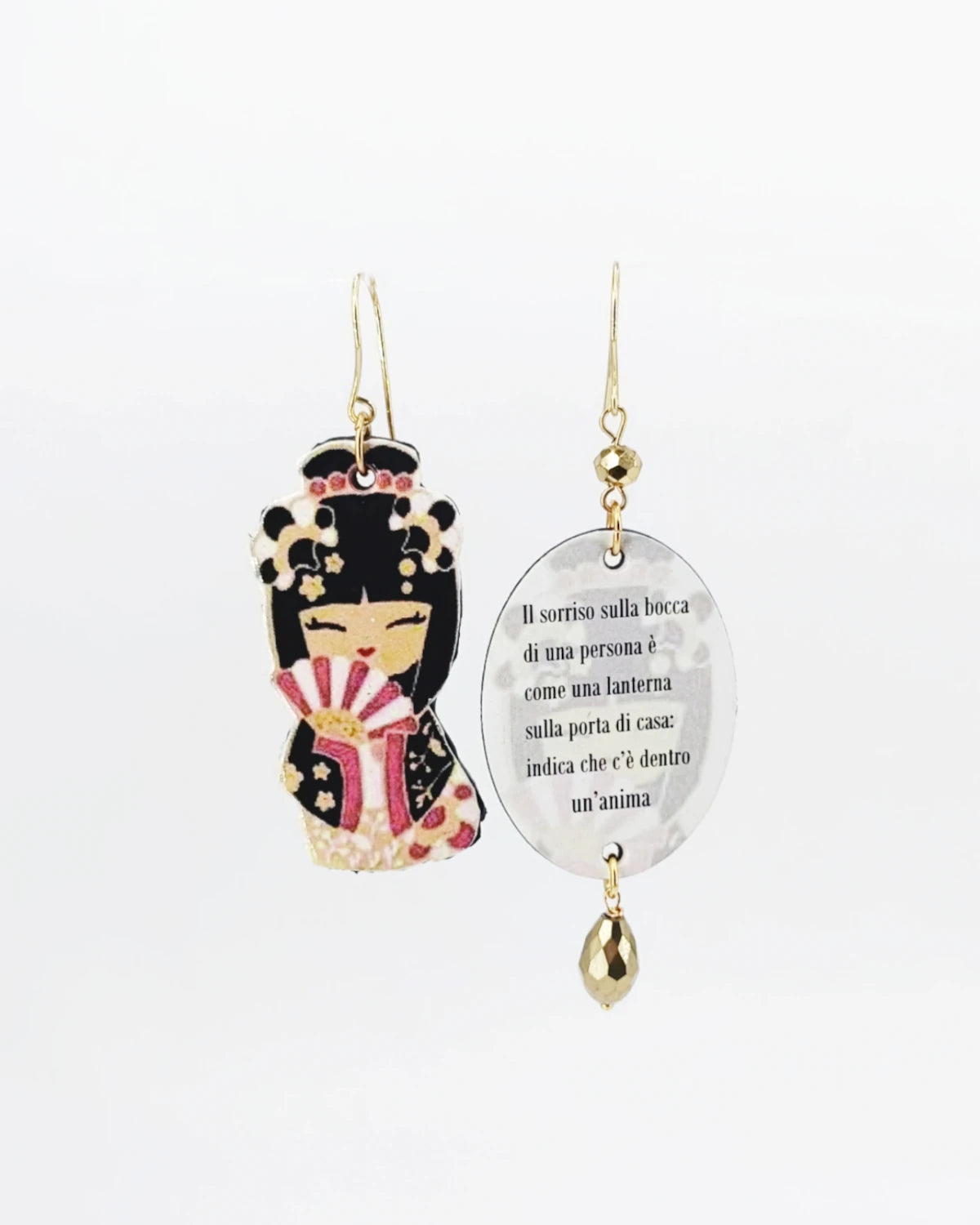 Orecchini di carta Il sorriso sulla bocca di una persona è come una lanterna