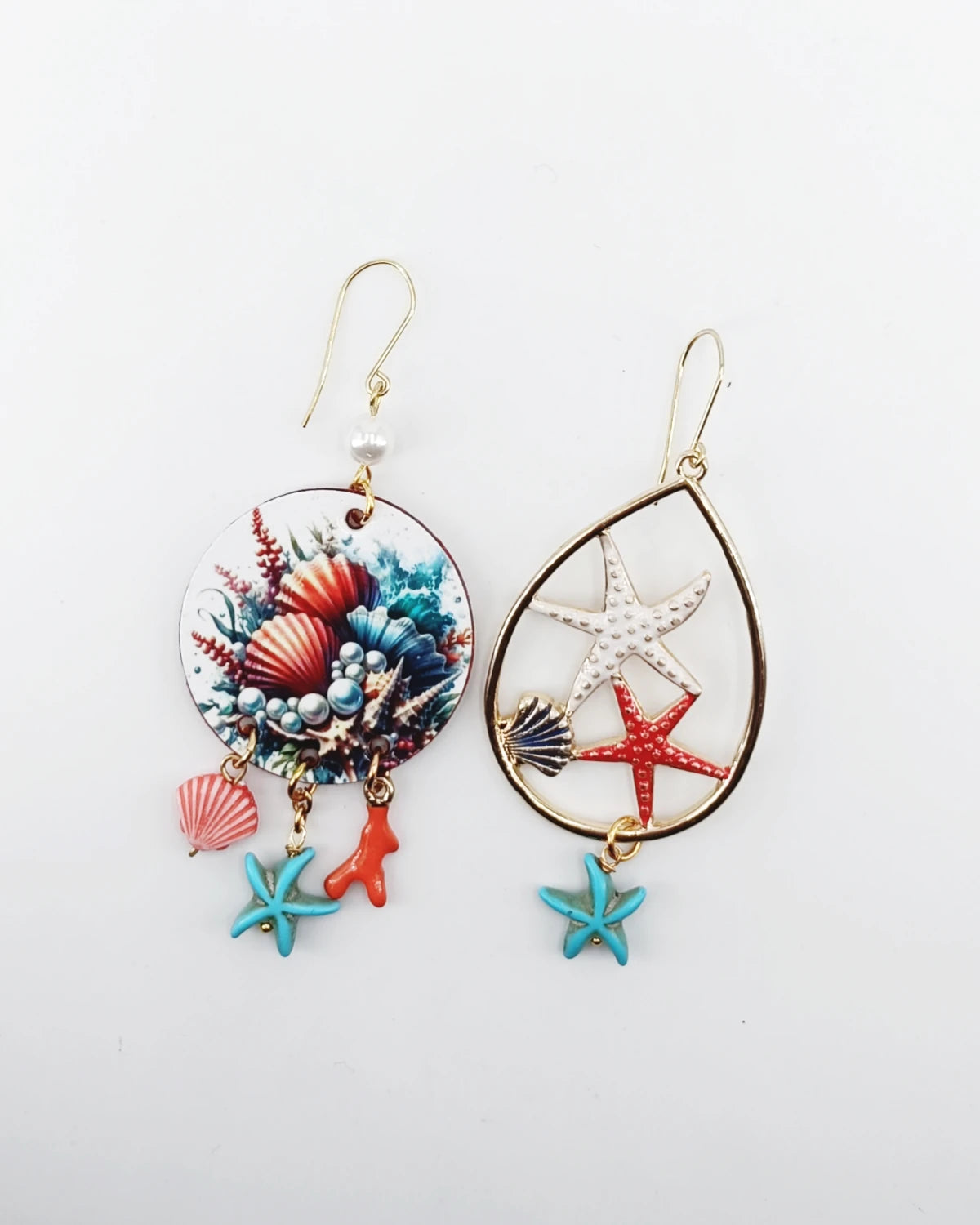 orecchini di carta Perle del mare appoggiati