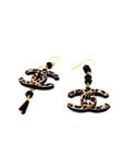 Orecchini Chanel animalier di carta